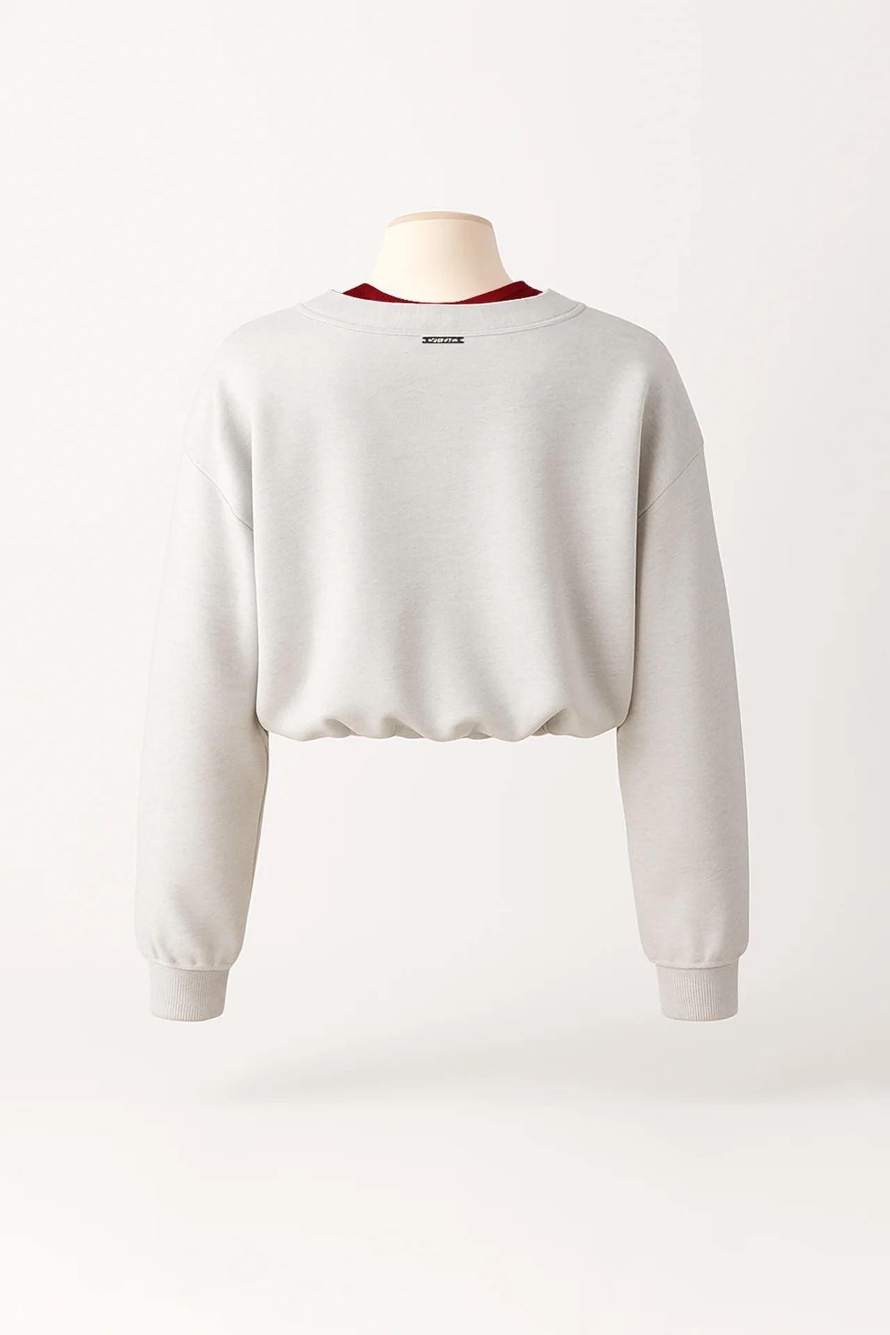 Sweatshirt cropped em cinzento com decote em V