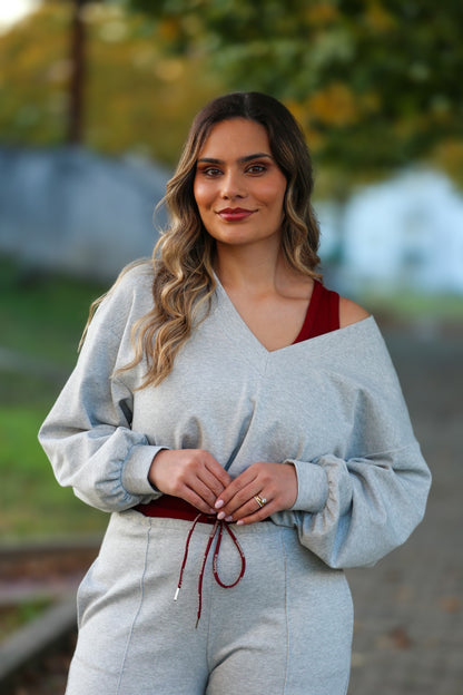 Calças jogger em cinzento claro com cintura contrastante