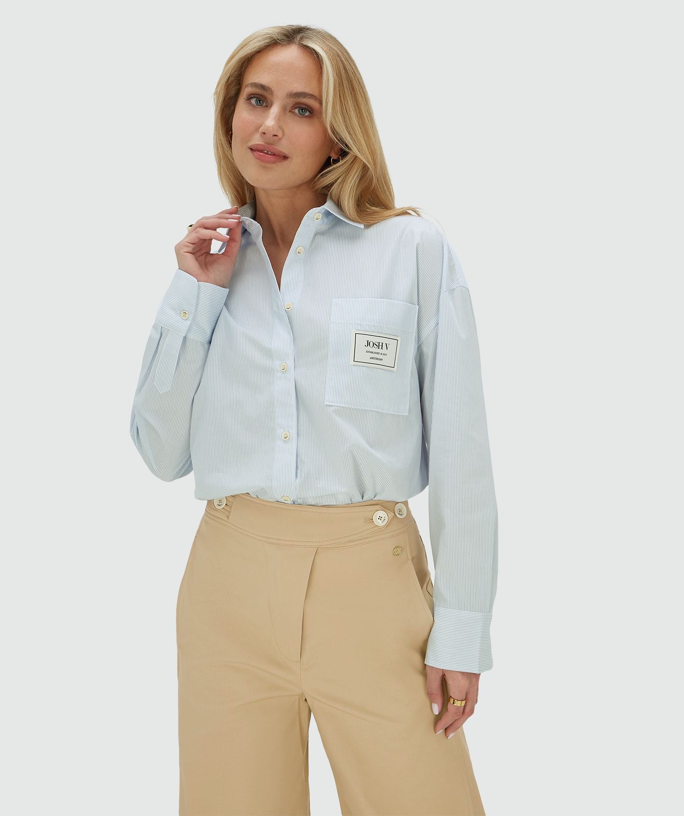 Blusa oversized com amarração em lenço - listras azuis vibrantes