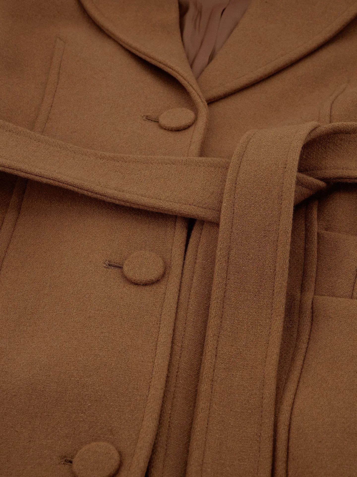 Casaco com detalhes em corrente