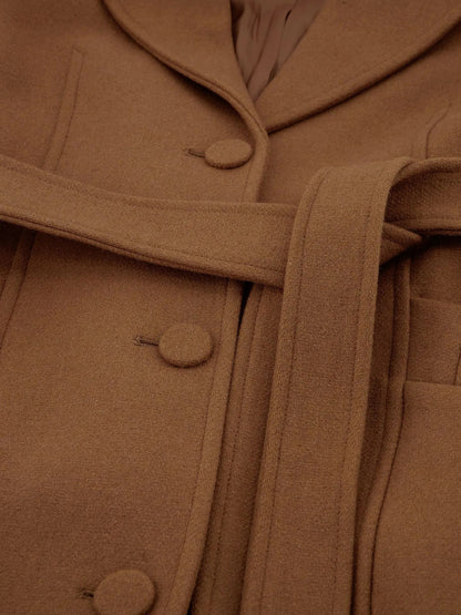 Casaco com detalhes em corrente