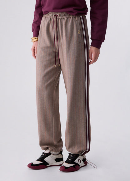 Calça taupe de perna larga com riscas laterais