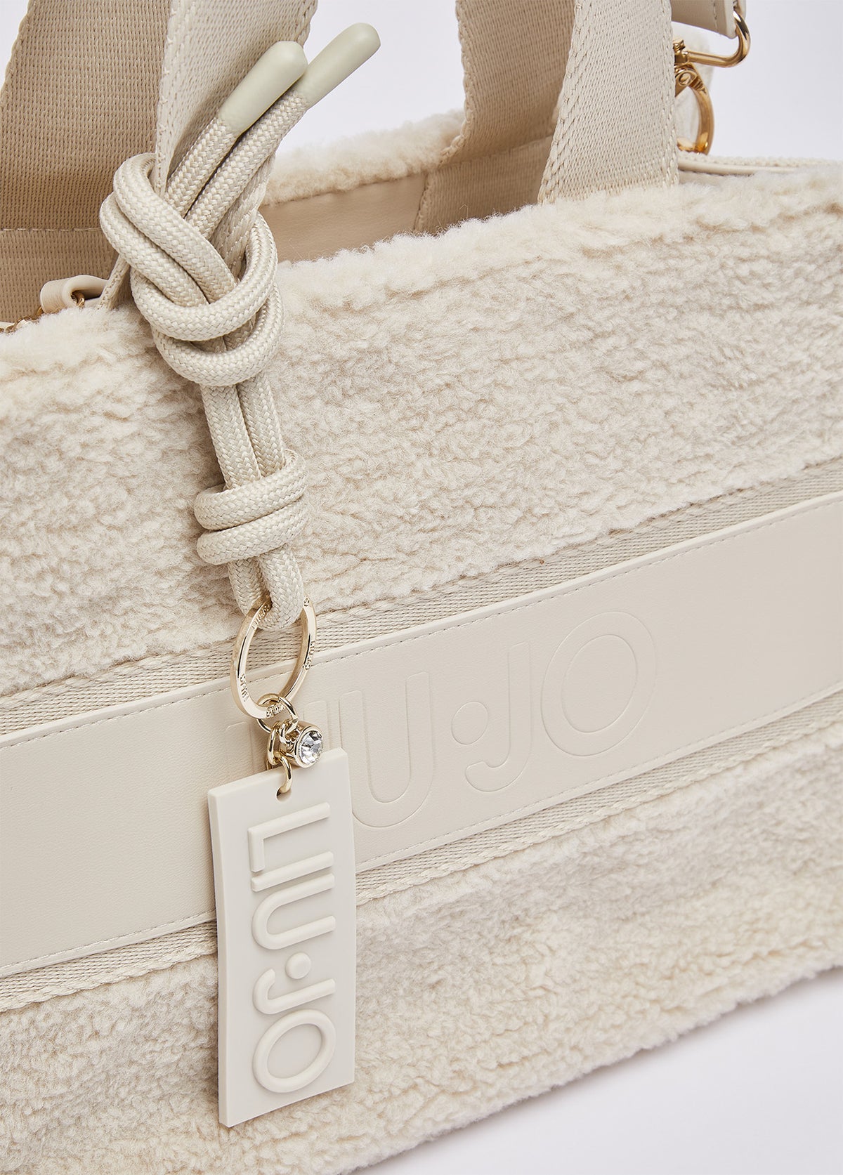Mala LIU JO em tom creme com textura teddy