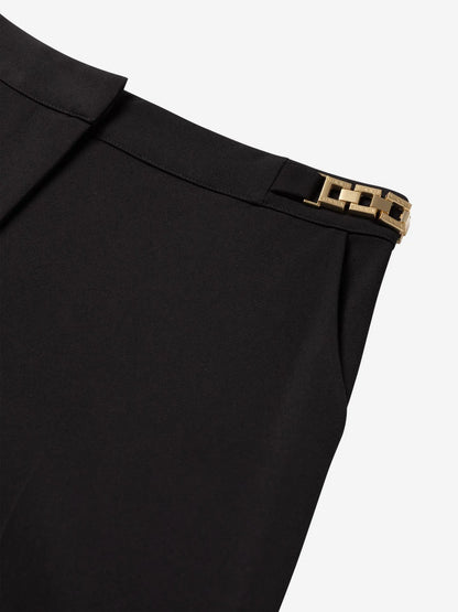 Calça com detalhe de corrente