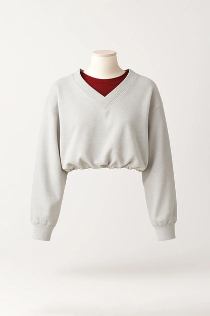 Sweatshirt cropped em cinzento com decote em V