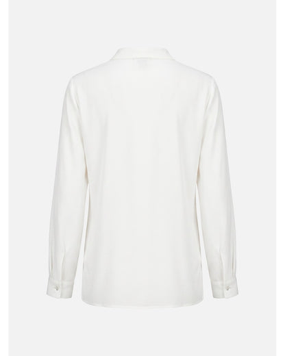 Blusa com corrente metálica