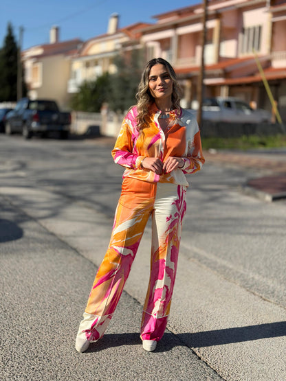 Blusa fluída estampada de ombro caído