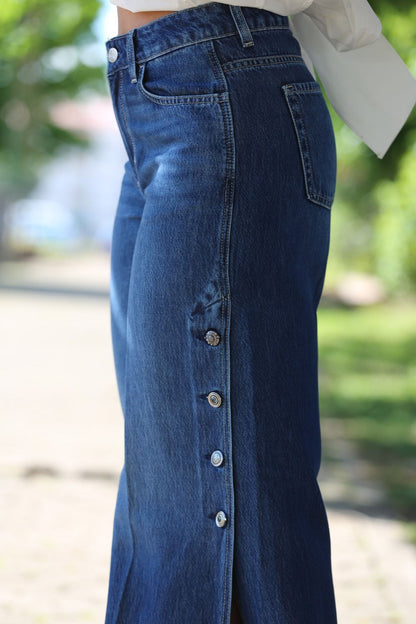 Calças jeans boca de sino com fendas