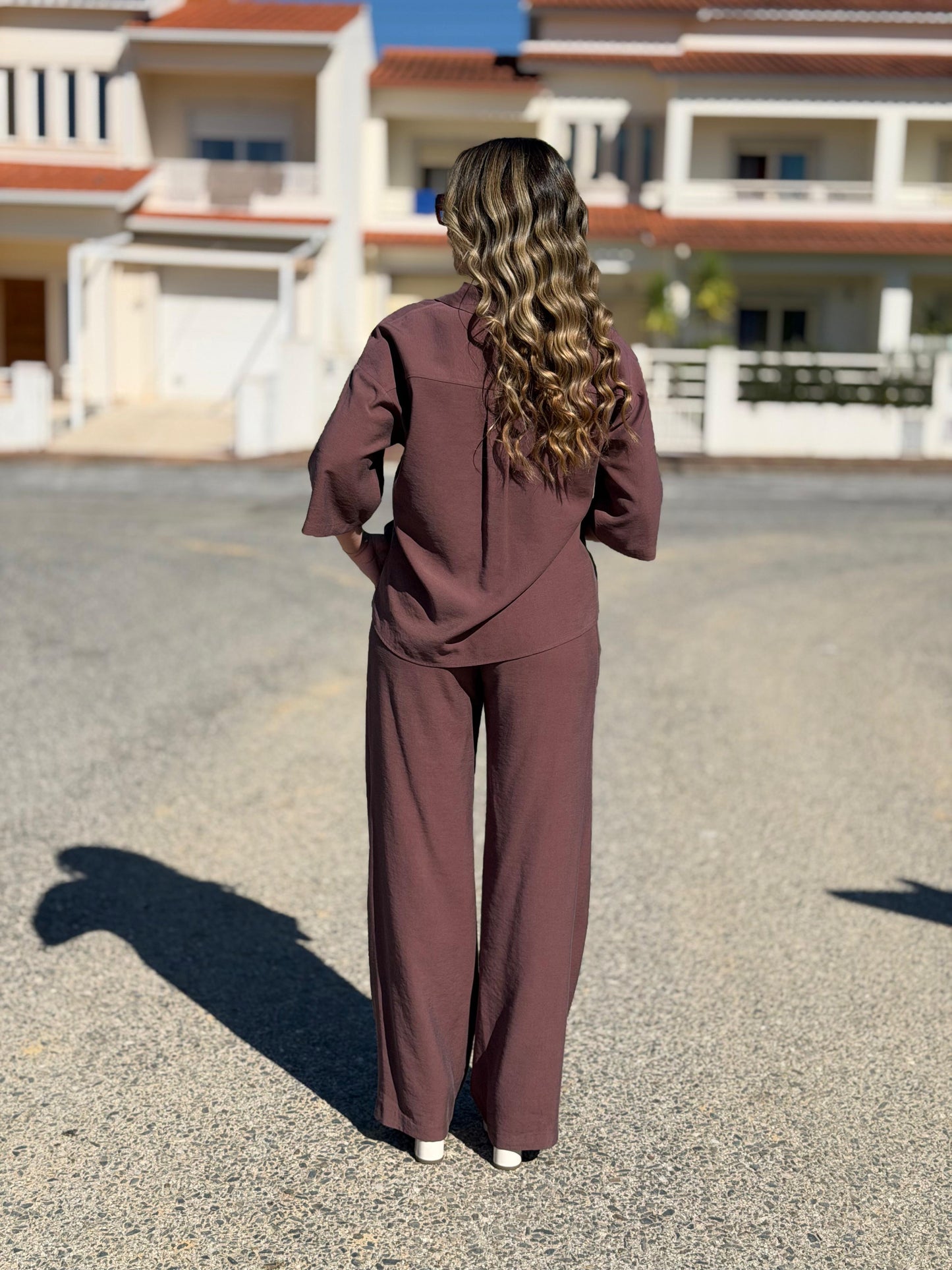 Calça clássica fluída com pinças