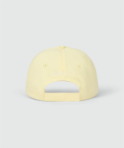 Boné com o logotipo HANNIE - amarelo manteiga
